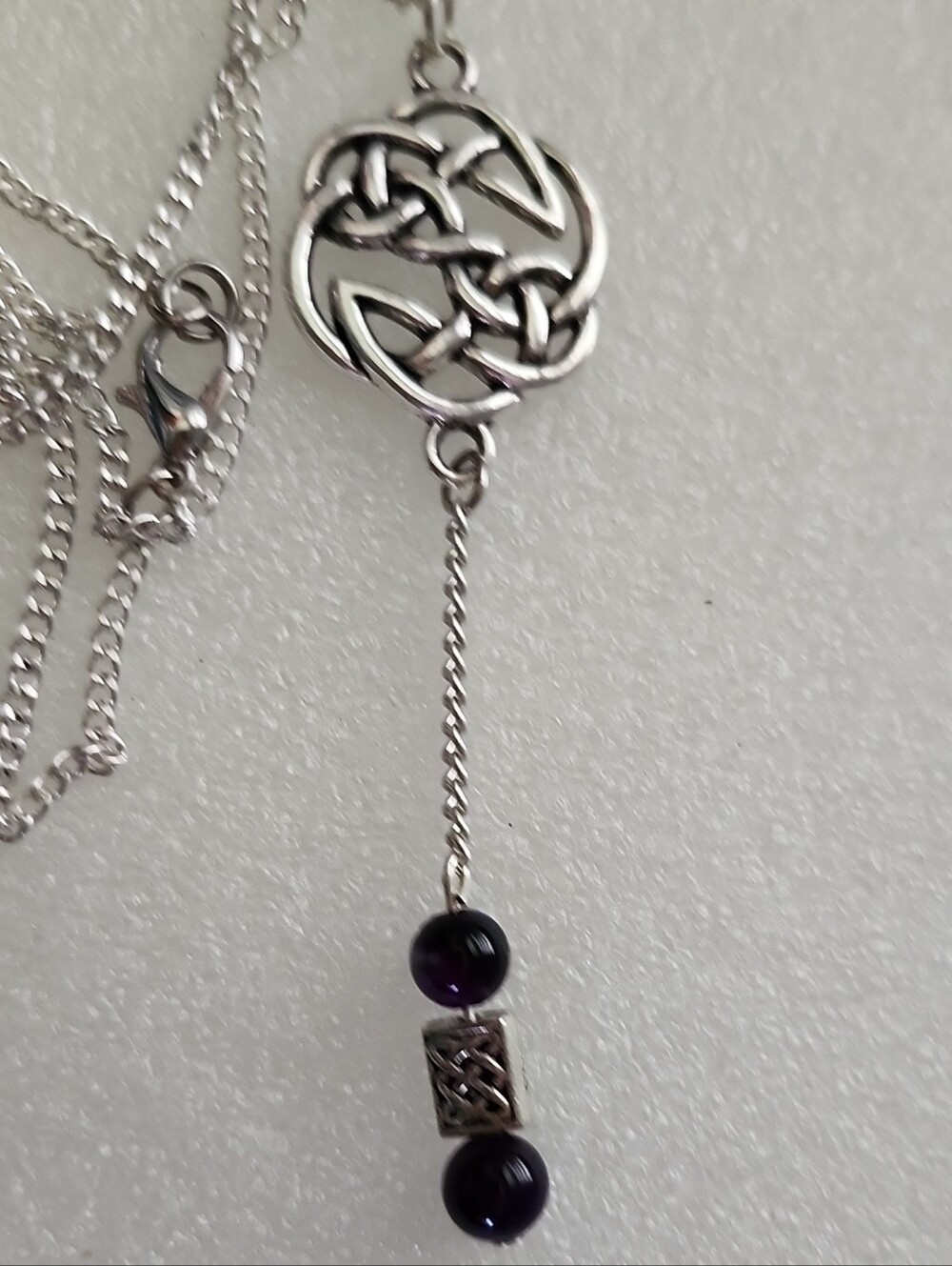 Hand Crafted Silver Celtic Knot Necklace with Purple Beads